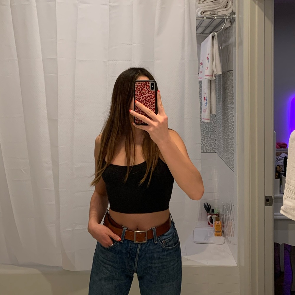 VINTAGE LEVI’S LIGHT/MEDIUM WASH JEANS